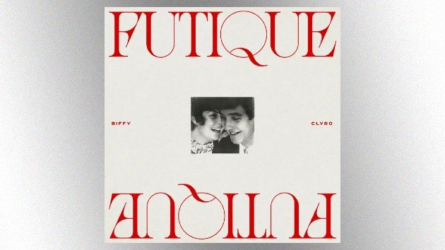 Biffy Clyro Futique Album, Due September 26 Album cover for Biffy Clyro’s 10th studio album “Futique,” featuring mirrored red typography and a black-and-white photo of two smiling individuals.