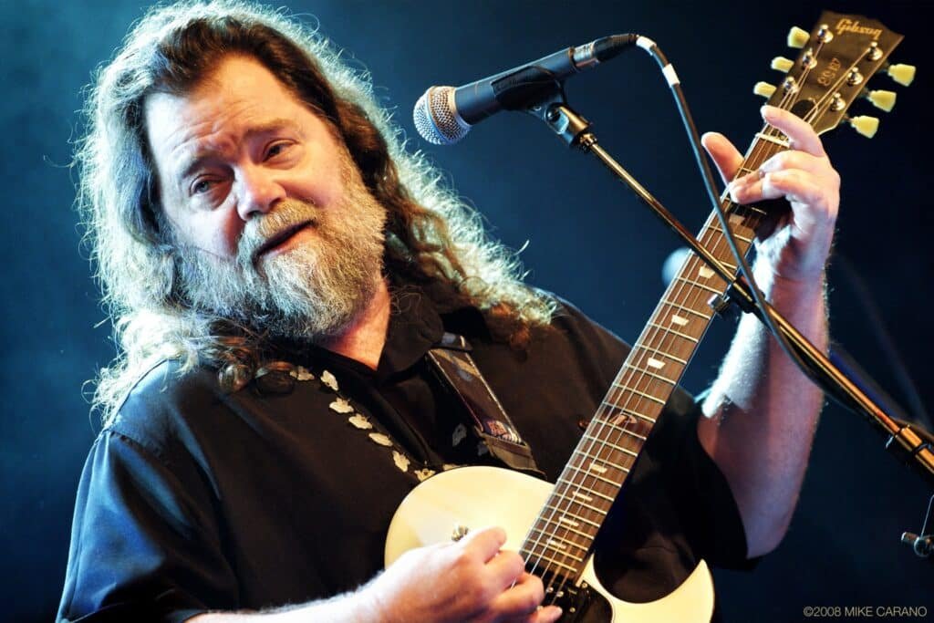 Roky Erickson performing live on stage with Gibson guitar, 2008