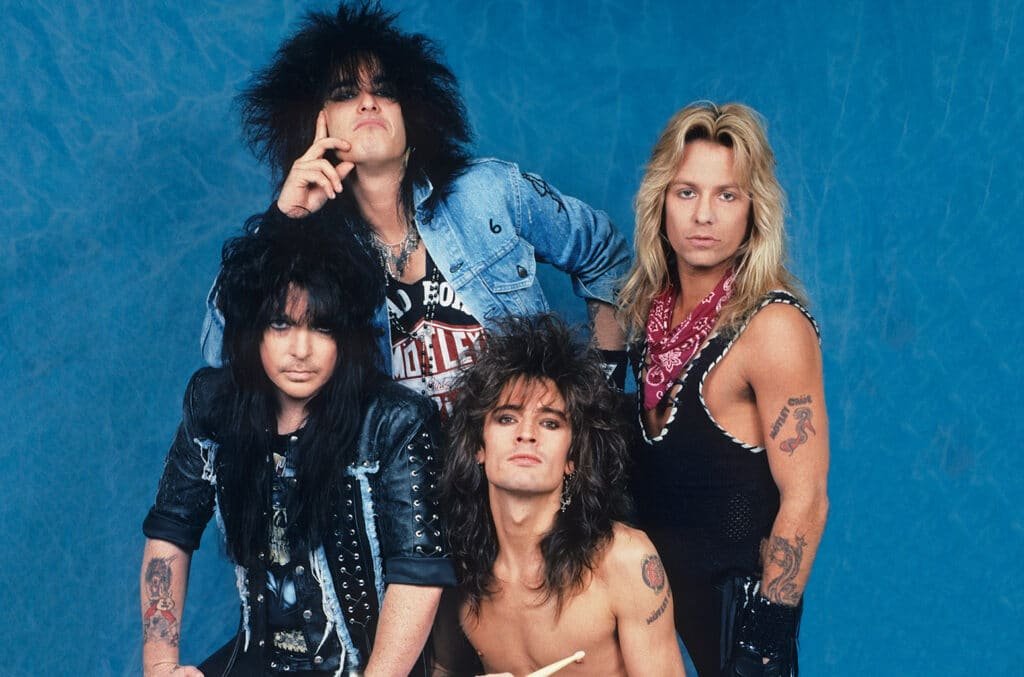 Motley Crue albums era photo featuring the original band members in glam metal style