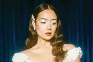 Laufey 2025 portrait photo with vintage styling and soft lighting