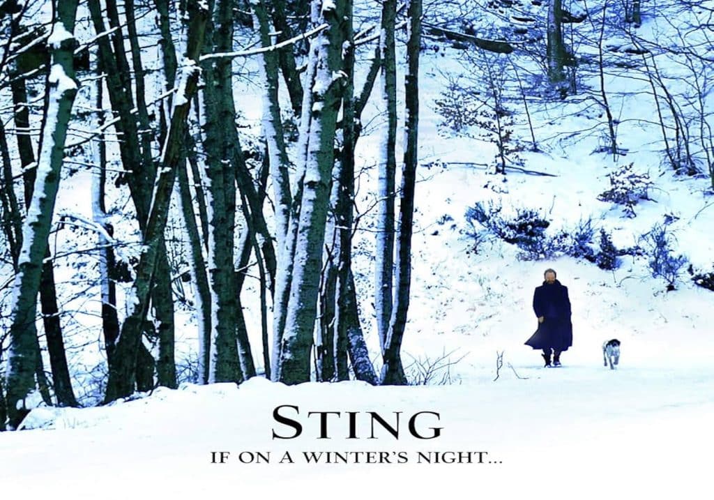 Sting walking through a snowy forest on the album cover for Sting If On A Winter’s Night