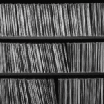 Artist and album guides featuring a vinyl record collection