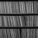 Artist and album guides featuring a vinyl record collection